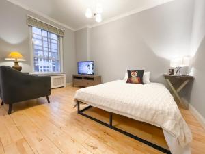 A bed or beds in a room at Double Room with private bathroom in a Shared flat in ZONE 1 !!!