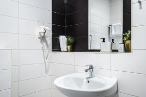 Ein Badezimmer in der Unterkunft National Plus