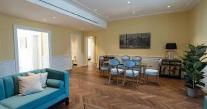 Μια τηλεόραση ή/και κέντρο ψυχαγωγίας στο Algilà Luxury Torrigiani Apartments