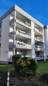 a large white building with balconies on it at Rooftop in Kehl bei Strasbourg in Kehl am Rhein