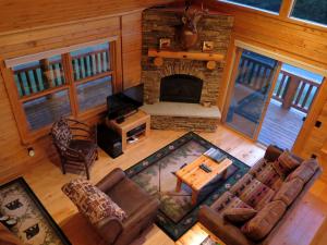 an overhead view of a living room with a fireplace at Mad River Cozy Cabin in Campton