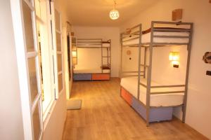 Postel nebo postele na pokoji v ubytování El Boussouni Hostel