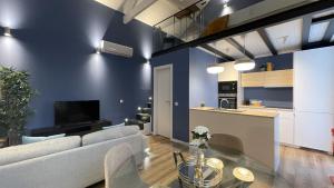 a living room with a couch and a table at MyTrip Porto in Matosinhos