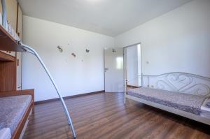 Łóżko lub łóżka w pokoju w obiekcie Livin Large Ana