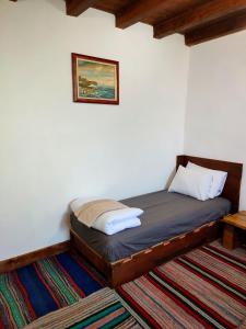 מיטה או מיטות בחדר ב-Apartments Alexandra