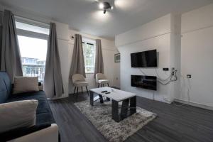 Ruang duduk di Stunning apartment in Dulwich