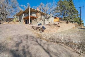 a house with a staircase in front of it at Brookside Mountain Modern Apartment / MTN views! in Colorado Springs