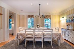 a dining room with a table and chairs at Vancouver Golf Villa - Private Oasis in Vancouver +53 photos