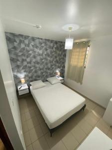 Postel nebo postele na pokoji v ubytování HOTEL LE CHANNEL