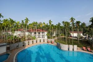 an image of a swimming pool at a resort at Malnad Shire Eco Resort in Shimoga