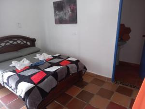 A bed or beds in a room at AZULEJO