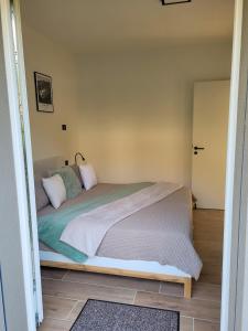 Un pat sau paturi într-o cameră la Vigna Panorama
