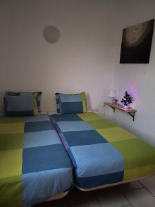 Ліжко або ліжка в номері Casa Xuami