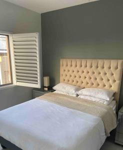 Postel nebo postele na pokoji v ubytování Luxury Apartment in Kyalami