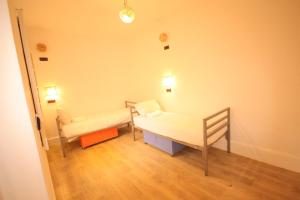 Postel nebo postele na pokoji v ubytování El Boussouni Hostel