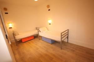 Postel nebo postele na pokoji v ubytování El Boussouni Hostel