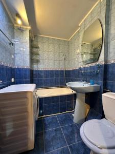 Phòng tắm tại Apartament Lupeni cu doua camere