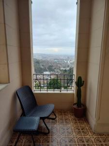 Casa das Luzes Hostel IVN的阳台或露台