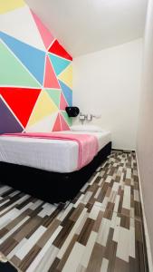Cama o camas de una habitación en Kromatic Hostel