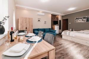 Posteľ alebo postele v izbe v ubytovaní Oliver Apartman