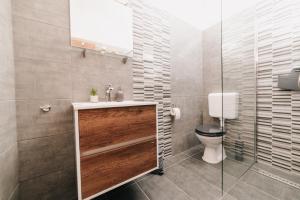 Kúpeľňa v ubytovaní Oliver Apartman