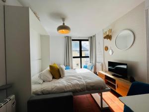 Postel nebo postele na pokoji v ubytování Apartamentos Bluettravel Snow Confort Monte Gorbea