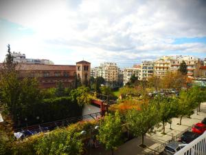 a view of a city with buildings and trees at Melia Luxury Studio in Thessaloniki