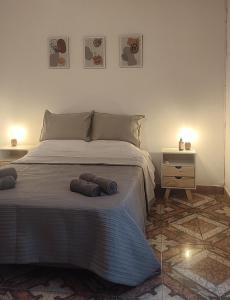 Ένα ή περισσότερα κρεβάτια σε δωμάτιο στο Apartamentos Mara - 100m de Termas