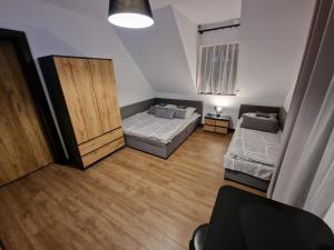 Posteľ alebo postele v izbe v ubytovaní Małe Ciche 36j PRZY OSTREWKACH, Widok na góry, Blisko do wyciągu narciarskiego, Idealne miejsce na wypad w góry -tarasówka-zgorzelisko-rusinowa polana-gesia szyja-palenica-wiktorówki-morskie oko