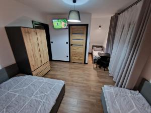 Posteľ alebo postele v izbe v ubytovaní Małe Ciche 36j PRZY OSTREWKACH, Widok na góry, Blisko do wyciągu narciarskiego, Idealne miejsce na wypad w góry -tarasówka-zgorzelisko-rusinowa polana-gesia szyja-palenica-wiktorówki-morskie oko