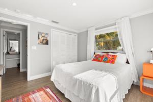 Un ou plusieurs lits dans un hébergement de l'établissement Peace & Sunshine 19 autres photos