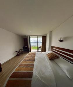 Postel nebo postele na pokoji v ubytování Hotel Refugio Santa Ines