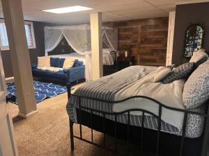 Кровать или кровати в номере Home Away