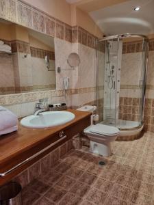 Koupelna v ubytování Likoria Hotel