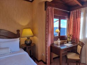 Postel nebo postele na pokoji v ubytování Likoria Hotel