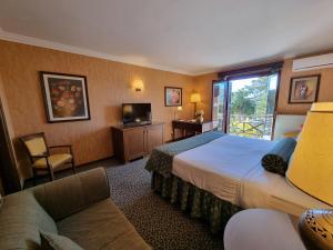 Postel nebo postele na pokoji v ubytování Likoria Hotel