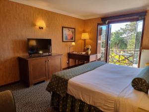 Postel nebo postele na pokoji v ubytování Likoria Hotel