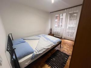 Ένα ή περισσότερα κρεβάτια σε δωμάτιο στο Apartment Ciglane - Pet friendly