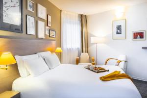 Postel nebo postele na pokoji v ubytování Mercure Hotel Forbach Centre de Loisirs + 37 fotografií