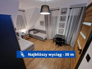 Posteľ alebo postele v izbe v ubytovaní Małe Ciche 36j PRZY OSTREWKACH, Widok na góry, Blisko do wyciągu narciarskiego, Idealne miejsce na wypad w góry -tarasówka-zgorzelisko-rusinowa polana-gesia szyja-palenica-wiktorówki-morskie oko