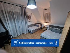 Posteľ alebo postele v izbe v ubytovaní Małe Ciche 36j PRZY OSTREWKACH, Widok na góry, Blisko do wyciągu narciarskiego, Idealne miejsce na wypad w góry -tarasówka-zgorzelisko-rusinowa polana-gesia szyja-palenica-wiktorówki-morskie oko