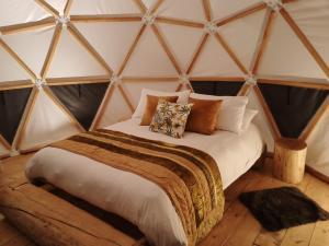 Postel nebo postele na pokoji v ubytování La Meca Glamping