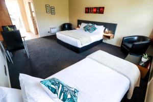 Postel nebo postele na pokoji v ubytování Coleraine Suites & Apartments