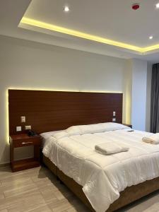 Cama ou camas em um quarto em EL ALAMO, EJECUTIVO Y SPA