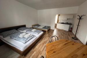 Postel nebo postele na pokoji v ubytování Apartments Gala Abertamy