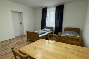 Postel nebo postele na pokoji v ubytování Apartments Gala Abertamy