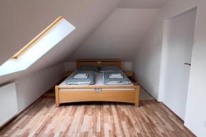 Postel nebo postele na pokoji v ubytování Apartments Gala Abertamy