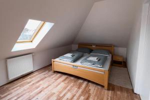 Postel nebo postele na pokoji v ubytování Apartments Gala Abertamy