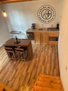 Kuchyň nebo kuchyňský kout v ubytování Betooz Cabin