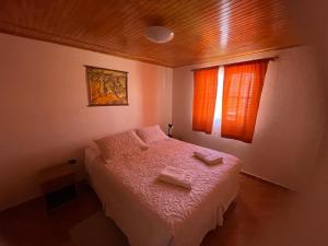 Letto o letti in una camera di Hostal Desert